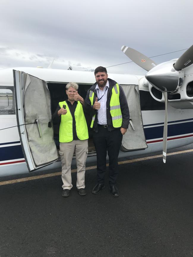 Pawmobile owner Fi Millhouse and pilot Josh Ewing after the first Bass Strait flight touched down at Devonport