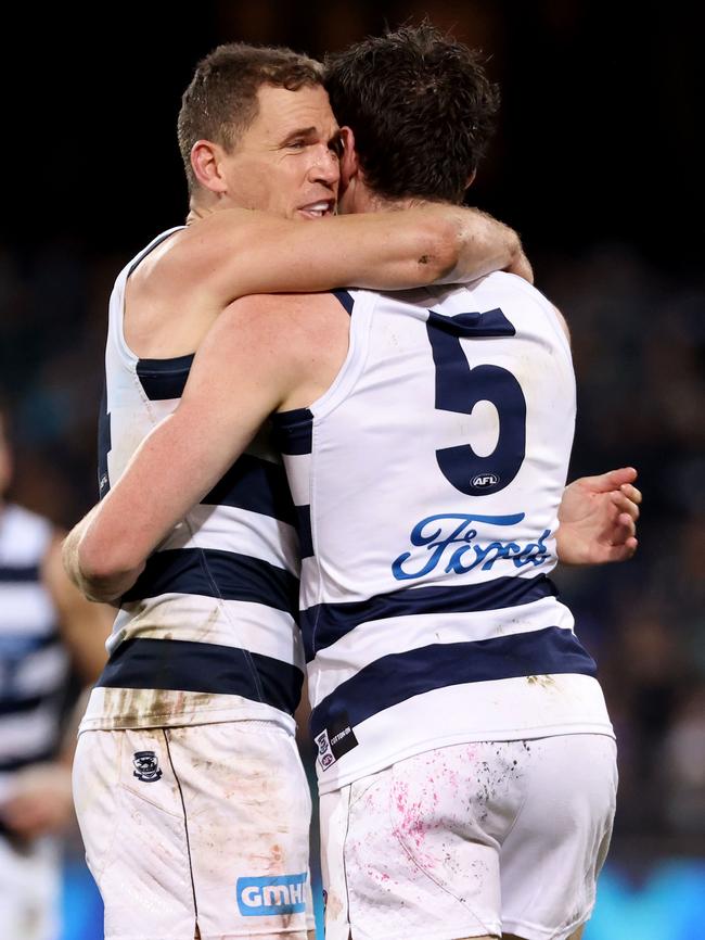 Selwood and Cameron embrace after a goal. Picture: Getty