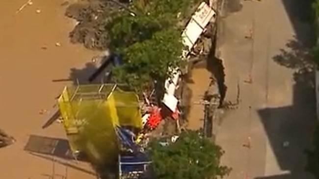 Bitumen and scaffolding fell into the waterlogged pit. Picture: 7 News