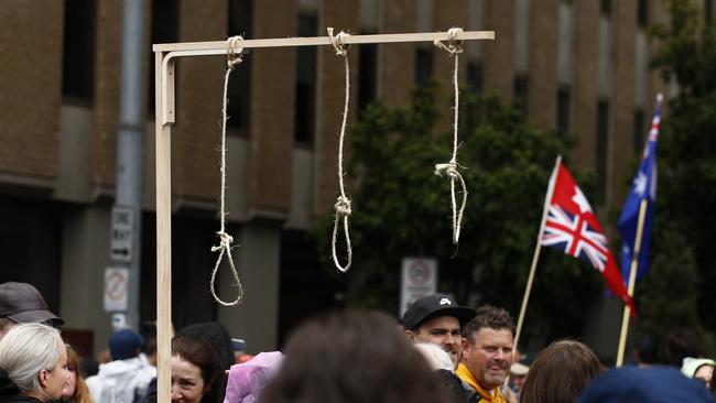 Gallows with nooses were brought by protesters to a rally against the Victorian government's proposed pandemic laws in November. Picture: NCA NewsWire / Daniel Pockett