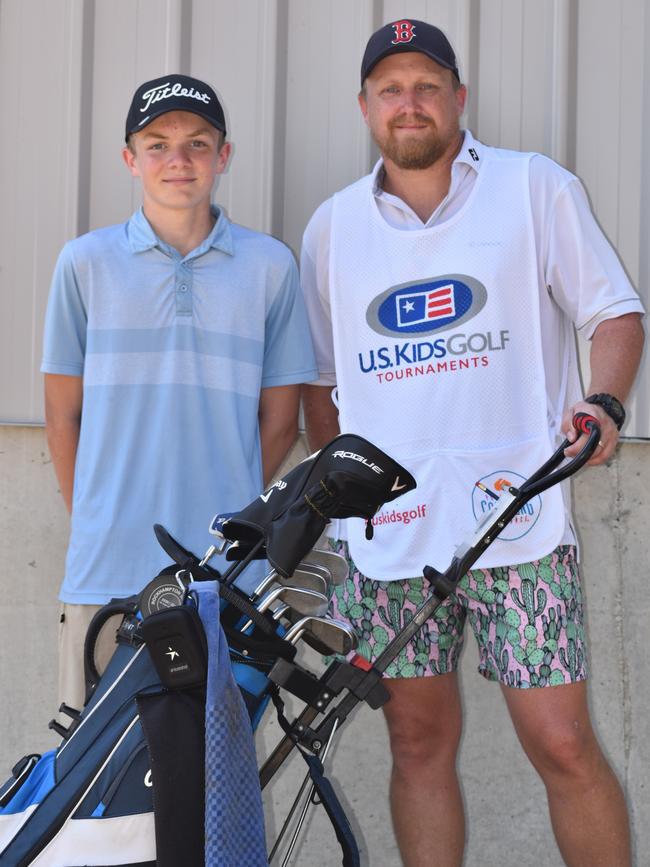 Rockhampton's Harrison Milne (boys 15-18 years) with Brandon Milne at the US Kids Golf Foundation Australian Open at the Rockhampton Golf Club on September 27.
