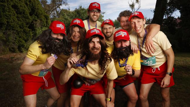 Cory Stone centre with some of his crew on his bucks weekend from Adelaide who all ran dressed as Forrest Gump.  2025 Cadbury Marathon.  Picture: Nikki Davis-Jones