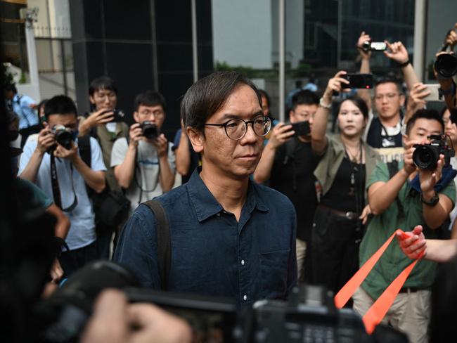 TOPSHOT - Chung Pui-kuen, the former chief editor of Hong Kong's now shuttered pro-democracy news outlet Stand News, leaves the district court in Hong Kong on August 29, 2024, after he was found guilty of conspiracy to publish seditious publications. (Photo by Peter PARKS / AFP)