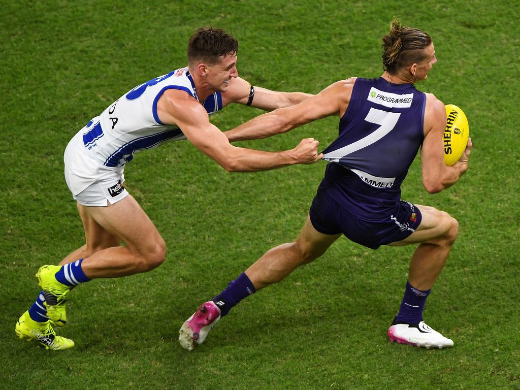 Nat Fyfe of the Dockers is tackled by Kayne Turner of the Kangaroos. Picture: Daniel Carson