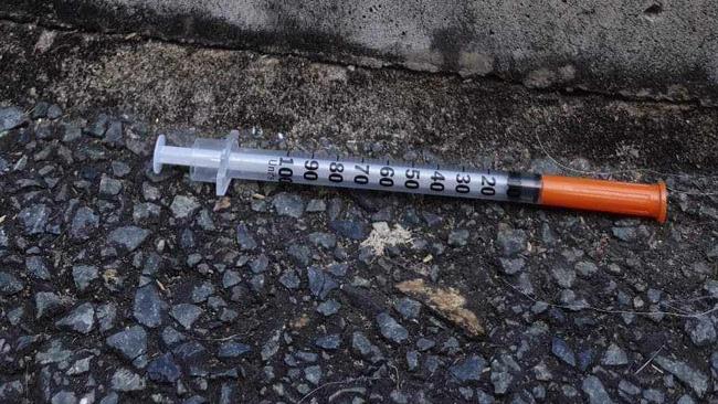 A syringe found in the gutter during Sunday’s march through the streets of Bethania.