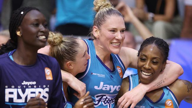 Lauren Jackson celebrates the game two win with teammates Nyadiew Puoch, Bec Cole and Jasmine Dickey. Picture: Getty Images