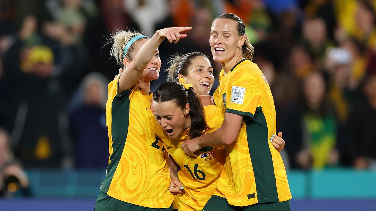 SYDNEY, AUSTRALIA - AUGUST 07: Hayley Raso (C) of Australia celebrates with teammates after scoring her team's second goal during the FIFA Women's World Cup Australia &amp; New Zealand 2023 Round of 16 match between Australia and Denmark at Stadium Australia on August 07, 2023 in Sydney, Australia. (Photo by Cameron Spencer/Getty Images) *** BESTPIX ***