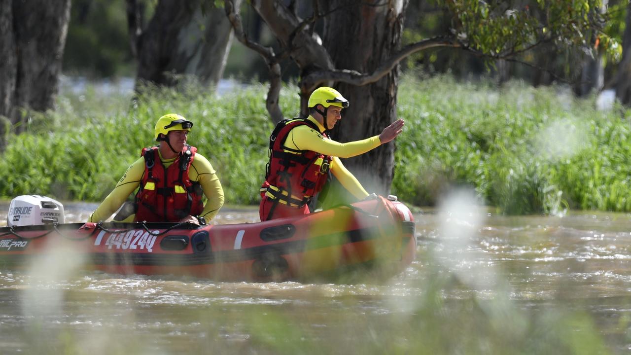 Police search for car missing in floodwater outside Toowoomba, December 1 2021.