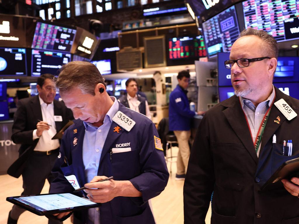 Traders work on the floor of the New York Stock Exchange as stocks rebounded after Donald Trump’s pause on tariffs. Picture: Getty Images via AFP