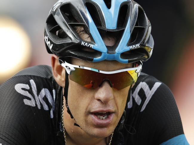 Australia's Richie Porte crosses the finish line of the tenth stage of the Tour de France cycling race over 161.5 kilometers (100.4 miles) with start in Mulhouse and finish in La Planche des Belles Filles, France, Monday, July 14, 2014. (AP Photo/Peter Dejong)