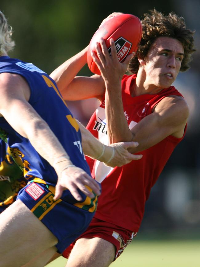 A young Shane Edwards in action for North Adelaide against the Eagles in 2006. Picture: Stephen Laffer