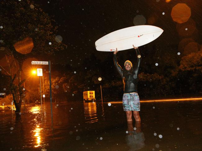 Surfs up: Manly local Paul Sawinski pictured on Golf Parade in Manly. Picture: Richard Dobson