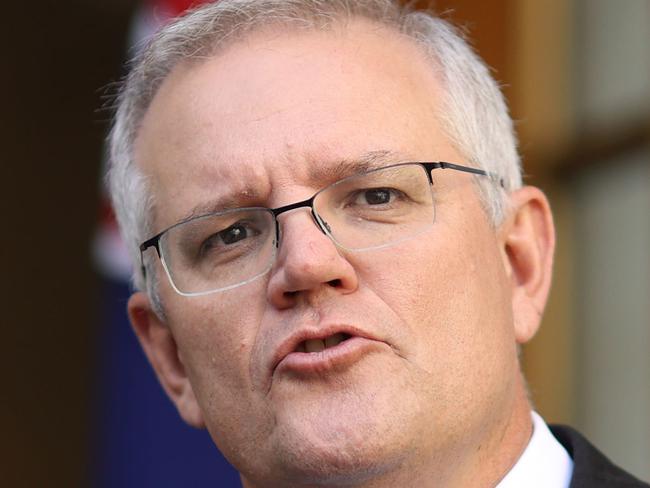 CANBERRA, AUSTRALIA - NewsWire Photos APRIL, 09, 2021:  Prime Minister Scott Morrison with Greg Hunt, during a  press conference at Parliament House in Canberra.Picture: NCA NewsWire/Gary Ramage