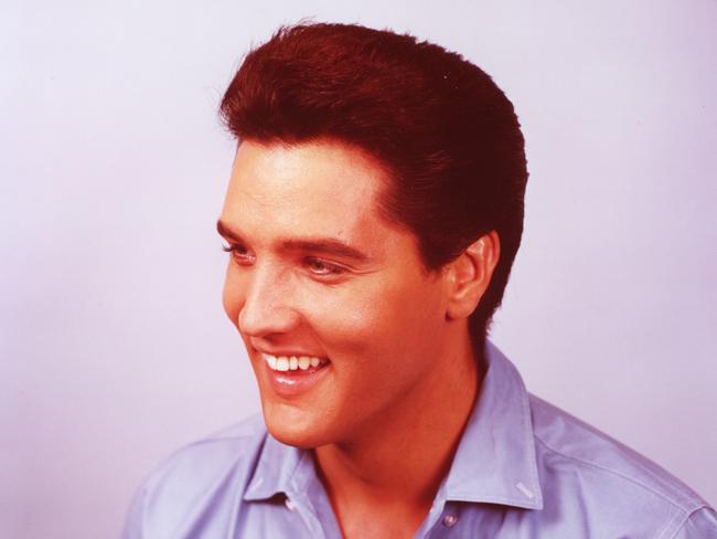 Elvis Presley. Blue shirt.