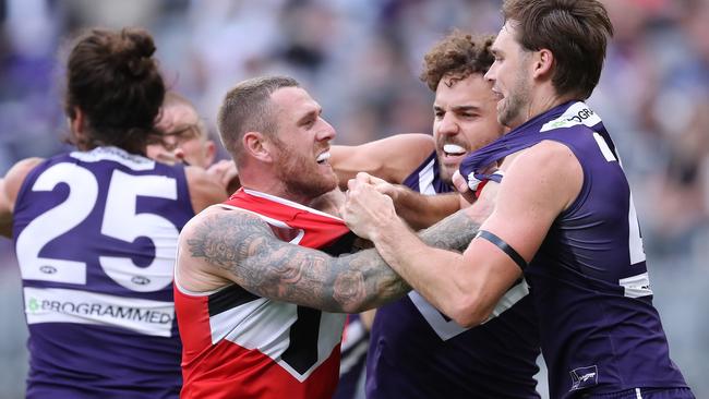 Tim Membrey faces off with his Fremantle opponents. Picture: Will Russell/AFL Photos via Getty Images