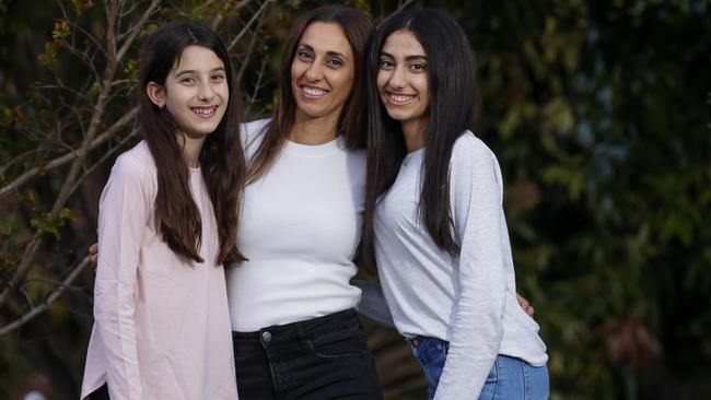 Gaye Xenos with her daughters Olivia, 10 and Natalia 15. Picture: Justin Lloyd