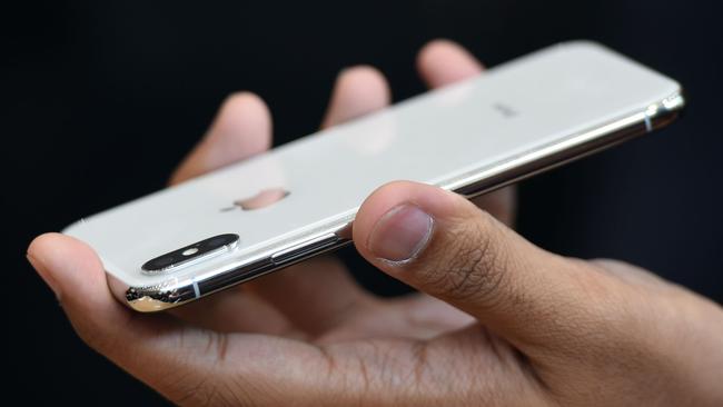 Apple’s new iPhone X features a facial scanner for security. Picture: AFP PHOTO / Josh Edelson