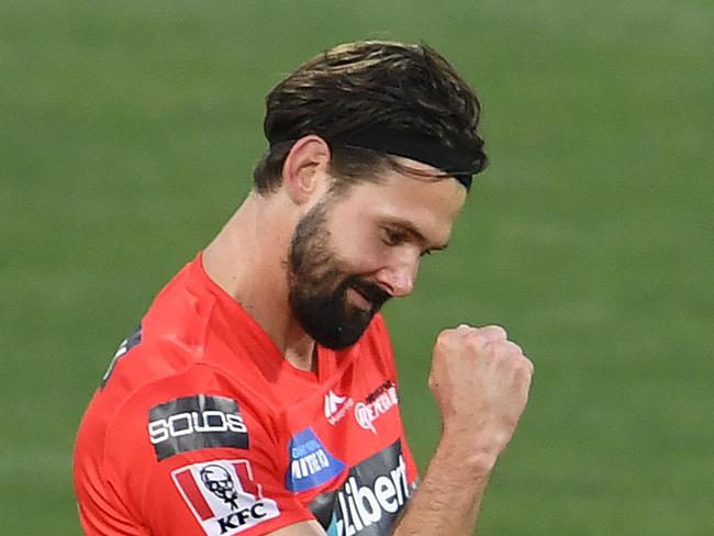 HOBART, AUSTRALIA - DECEMBER 12: Kane Richardson of the Renegades celebrates the wicket of Andrew Tye of the Scorchers during the Big Bash League match between the Melbourne Renegades and Perth Scorchers at Blundstone Arena, on December 12, 2020, in Hobart, Australia. (Photo by Steve Bell/Getty Images)