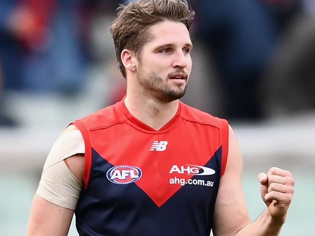 MELBOURNE, AUSTRALIA - AUGUST 20:  Jesse Hogan of the Demons celebrates winning the round 22 AFL match between the Melbourne Demons and the Brisbane Lions at Melbourne Cricket Ground on August 20, 2017 in Melbourne, Australia.  (Photo by Quinn Rooney/Getty Images)