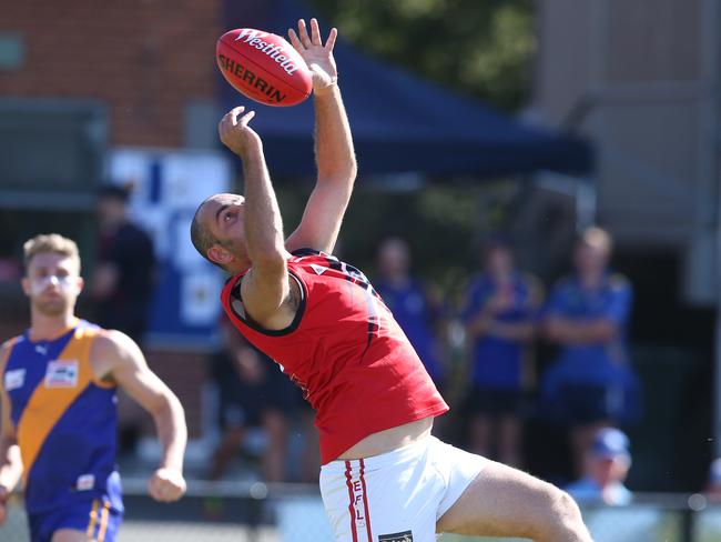 Matt Sharpe juggles a mark during his time at Waverley Blues. Picture: David Crosling