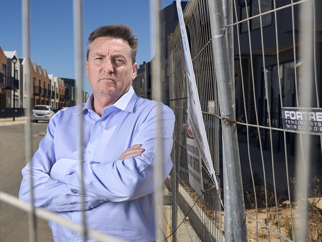 Resident, Andrew Curran at home in Port Adelaide, where an unfinished development has been left stagnant, Wednesday, Feb. 19, 2025. Picture: Matt Loxton