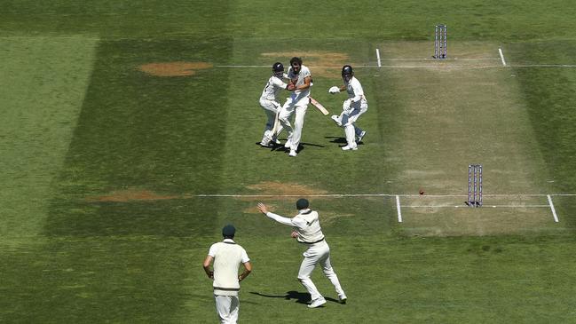 Kane Williamson collides with Will Young before being run out during day two at Basin Reserve. Picture: Hagen Hopkins/Getty Images.