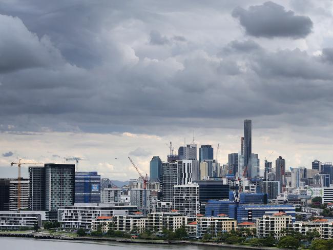 A general view of Brisbane City under dark clouds, Brisbane, October 23, 2017. (AAP Image/Jono Searle) NO ARCHIVING