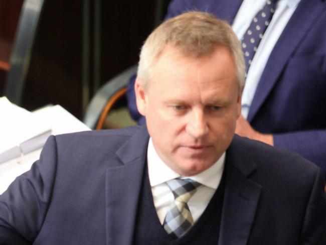 Education Minister Jeremy Rockliff gestures towards opposition members during Question Time in the Tasmanian House of Assembly.