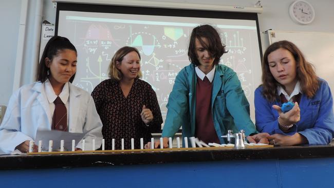 Wavell State High School science teacher Rachel Schnitzerling (2nd from left) with Year 10 students Attalia Lagoudakis, Sean Nicolas and Chloe Todd.