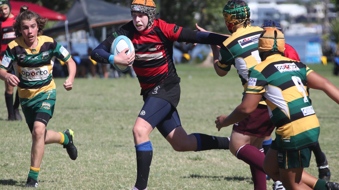 King of the Country U/13 Rugby Union tournament at Overall park Southport. Surfers Paradise(Yellow Green ) V Far North Coast (red black). Picture Glenn Hampson