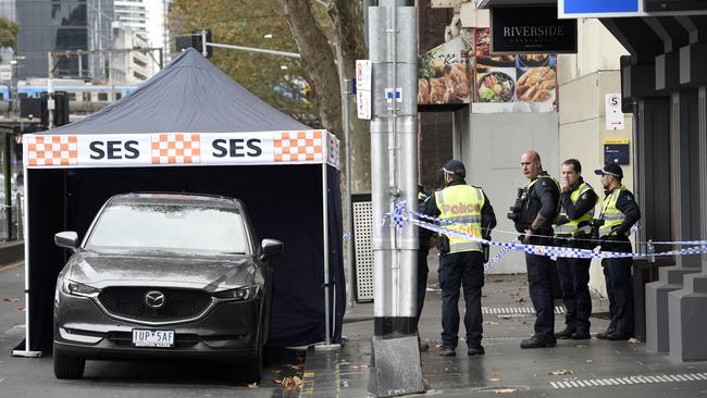 The driver of a dark-coloured Mazda that struck a woman has been released by police. Picture: NCA NewsWire / Andrew Henshaw