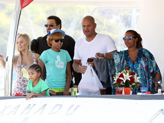 Lorraine Gilles cruising the Sydney Harbour with the family. Picture: Australscope.