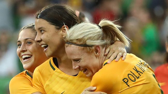 Matildas star Sam Kerr (centre) celebrates scoring against China on Wednesday night.