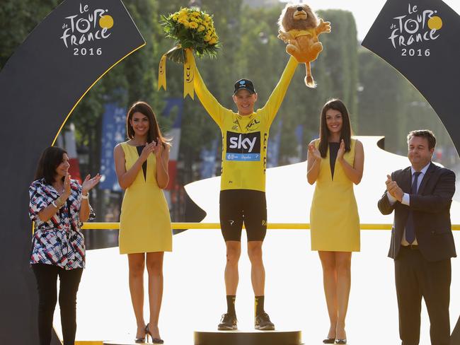 Chris Froome celebrates winning another Tour de France title.