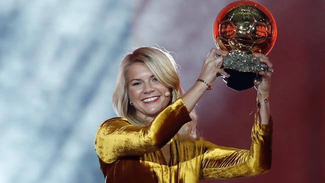 Olympique Lyonnais' Ada Hegerberg celebrates with the Women's Ballon d'Or award. Picture: AP