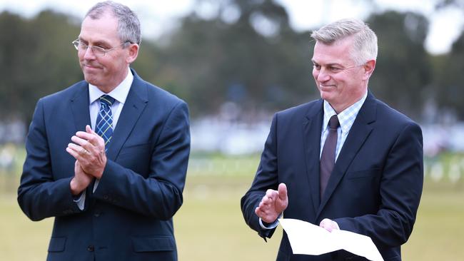 Andrew Ingleton (right) with his predecessor Tony Dodemaide at an announcement in Geelong in 2016. Picture: Peter Ristevski