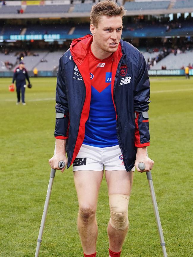 Tom McDonald on crutches after being injured in Round 16.