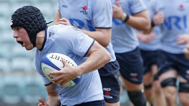 Waratahs' Brendan Palmer playing in the Under 19s Waratahs v Melbourne Rebels game last year. He was a first half try scorer against the Reds. Picture: John Appleyard.