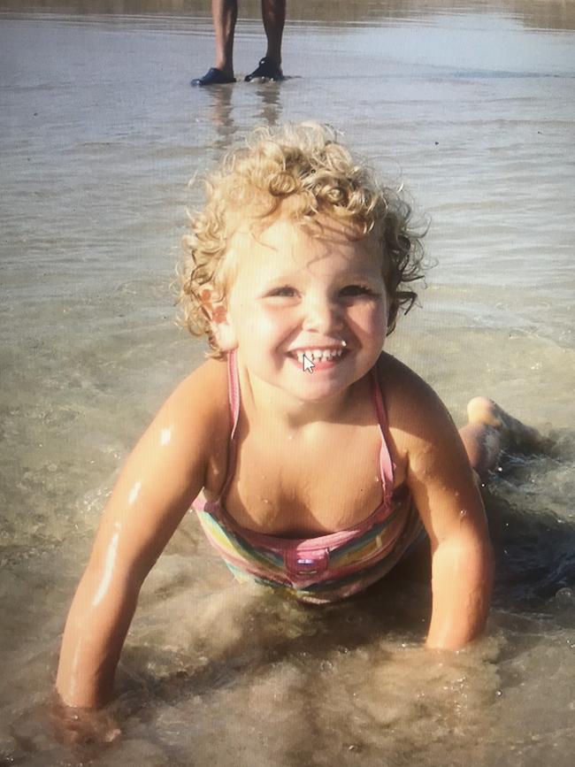 Her dad Richard has fond memories of Bridie at the beach as a young girl. Picture: Supplied