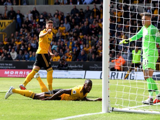 WOLVERHAMPTON, ENGLAND - AUGUST 25:  Willy Boly of Wolverhampton Wanderers celebrates after scoring his team's first goal with Matt Doherty during the Premier League match between Wolverhampton Wanderers and Manchester City at Molineux on August 25, 2018 in Wolverhampton, United Kingdom.  (Photo by Shaun Botterill/Getty Images)