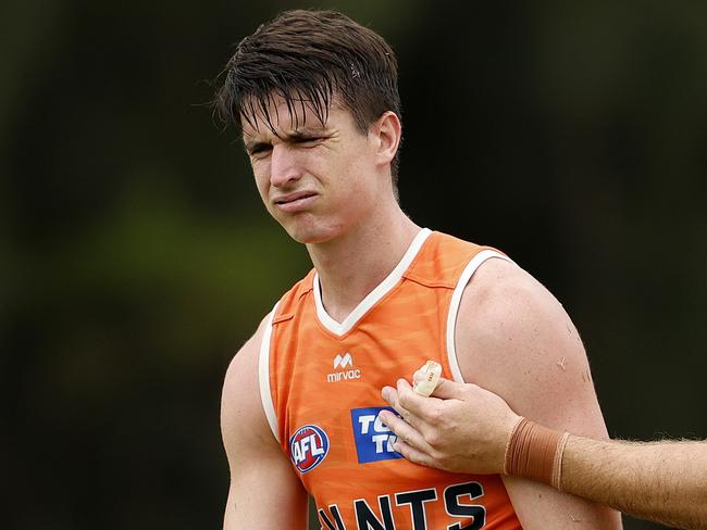 Sam Taylor after a heavy collision with Aaron Cadman and Jesse Hogan during the GWS Giants match simulation training session on February 14, 2025. Photo by Phil Hillyard (Image Supplied for Editorial Use only - **NO ON SALES** - Â©Phil Hillyard )