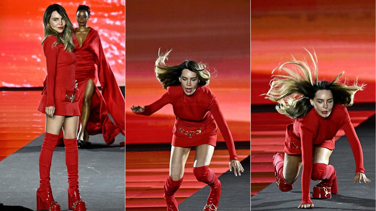 Mexican pop star Belinda took a tumble during the L’Oreal Paris Fashion Week catwalk show. Picture: Julien De Rosa/AFP