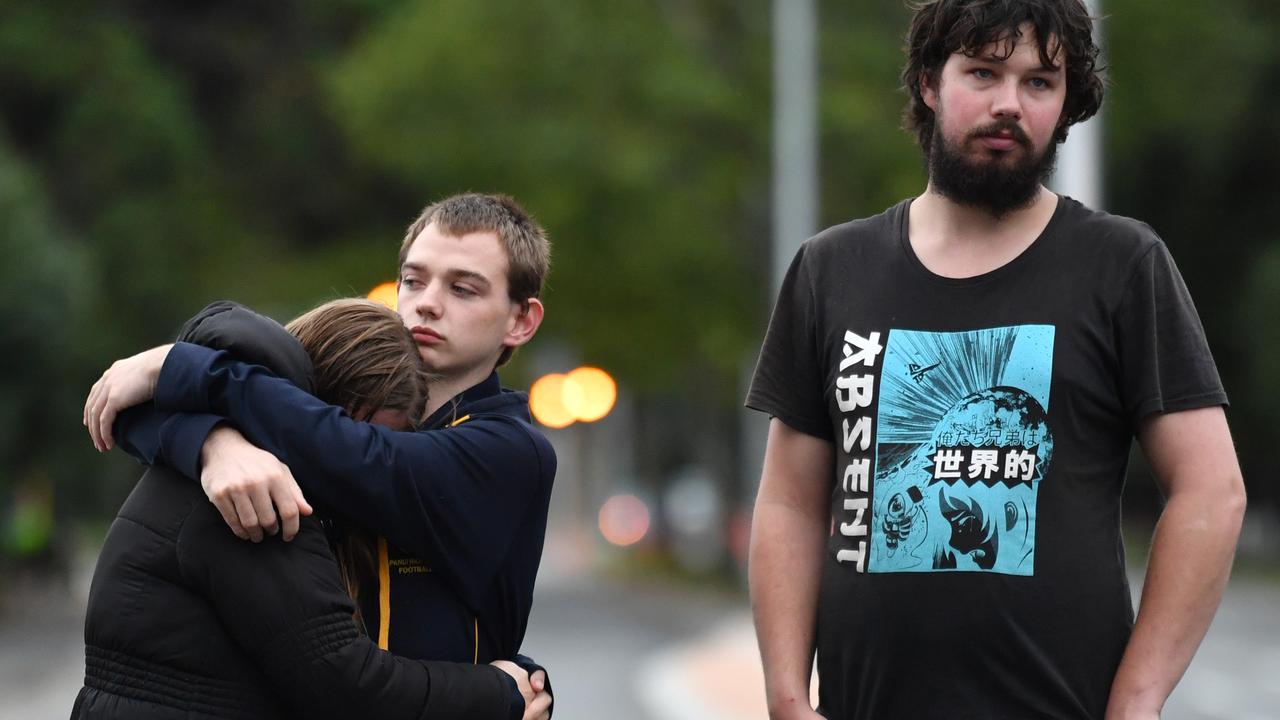 Members of the public mourn after a gunman killed 50 worshippers at the Al Noor and Linwood mosques in Christchurch. Picture: AAP Image/Mick Tsikas.