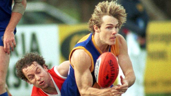 Williamstown's Sam Cranage is tackled by Bullant's Matthew Penn. Williamstown v Northern Bullants at Williamstown. VFL. Picture: Faith Nulley