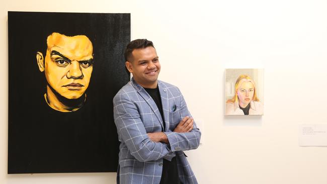 Indigenous actor Meyne Wyatt with his Packing Room Prize-winning self-portrait at the Art Gallery of NSW in Sydney. Picture: Britta Campion