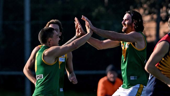 Spotswood’s Shamus Tippett celebrates a goal with a teammate. Picture: Andy Brownbill