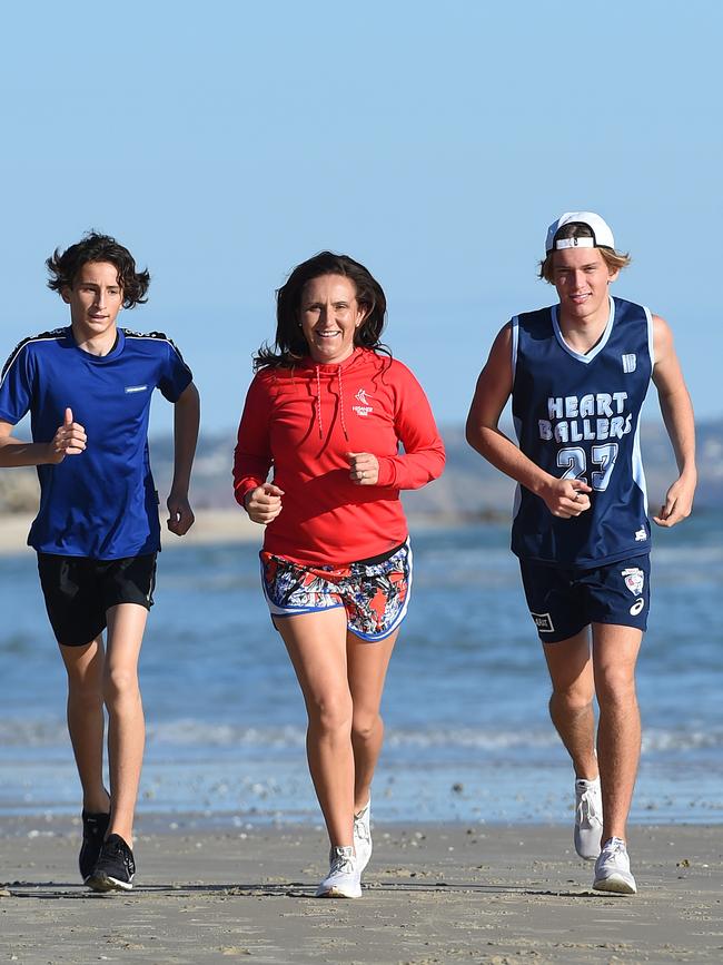 Fitness coach Anna Liptak in 2020 training with her sons, Lachy and Zach, just months after contracting Covid. Picture: Naomi Jellicoe