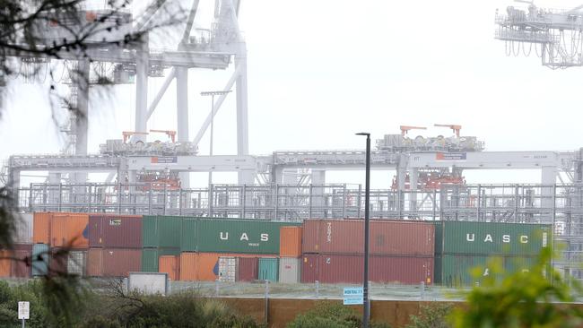 Containers stacked up high at Webb Dock unable to leave because of an industrial dispute. Pic: Michael Klein