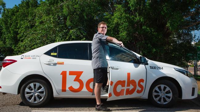 Driver Shane Daly with a new addition to the Taxi market in Darwin as 13Cabs launch . Picture GLENN CAMPBELL