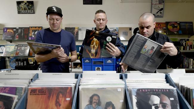 Hilltop Hoods crate-digging at Clarity Records in Adelaide ahead of Record Store Day on June 12. Picture: Naomi Jellicoe